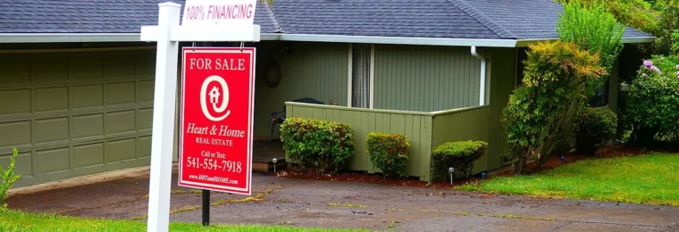 For sale sign in front of a house in Eugene, Oregon.
