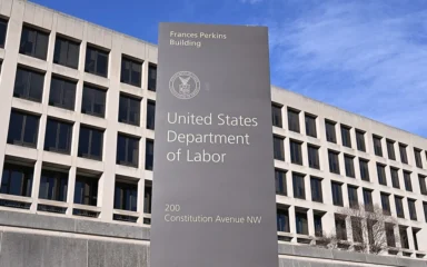 United States Department of Labor sign outside the Frances Perkins Building in Washington, D.C.