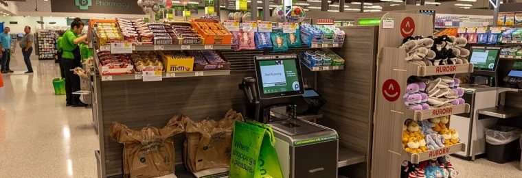 Self-checkout aisle inside a Publix supermarket in Orlando, Florida.