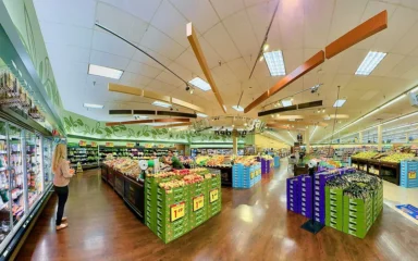Interior of a Smith's supermarket in Las Vegas, Nevada, with produce displays and shoppers.