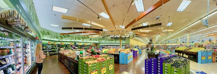 Interior of a Smith's supermarket in Las Vegas, Nevada, with produce displays and shoppers.