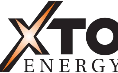 XTO Energy logo in black and orange.