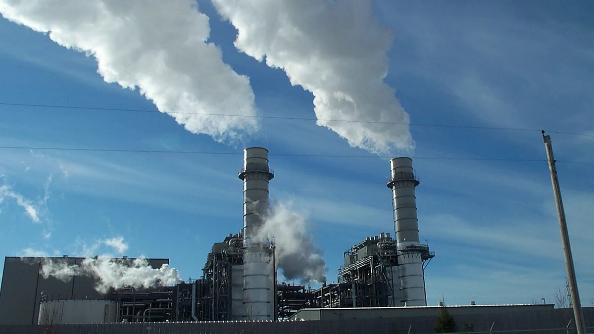 Two tall stacks and vapor plumes at Riverside Energy Center in Wisconsin.