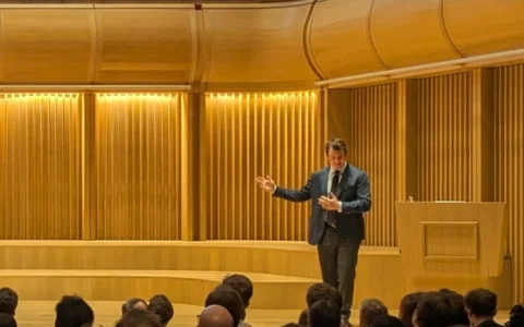 Anthropic co-founder Jack Clark speaking onstage to an audience at Oxford’s Schwarzman Centre.