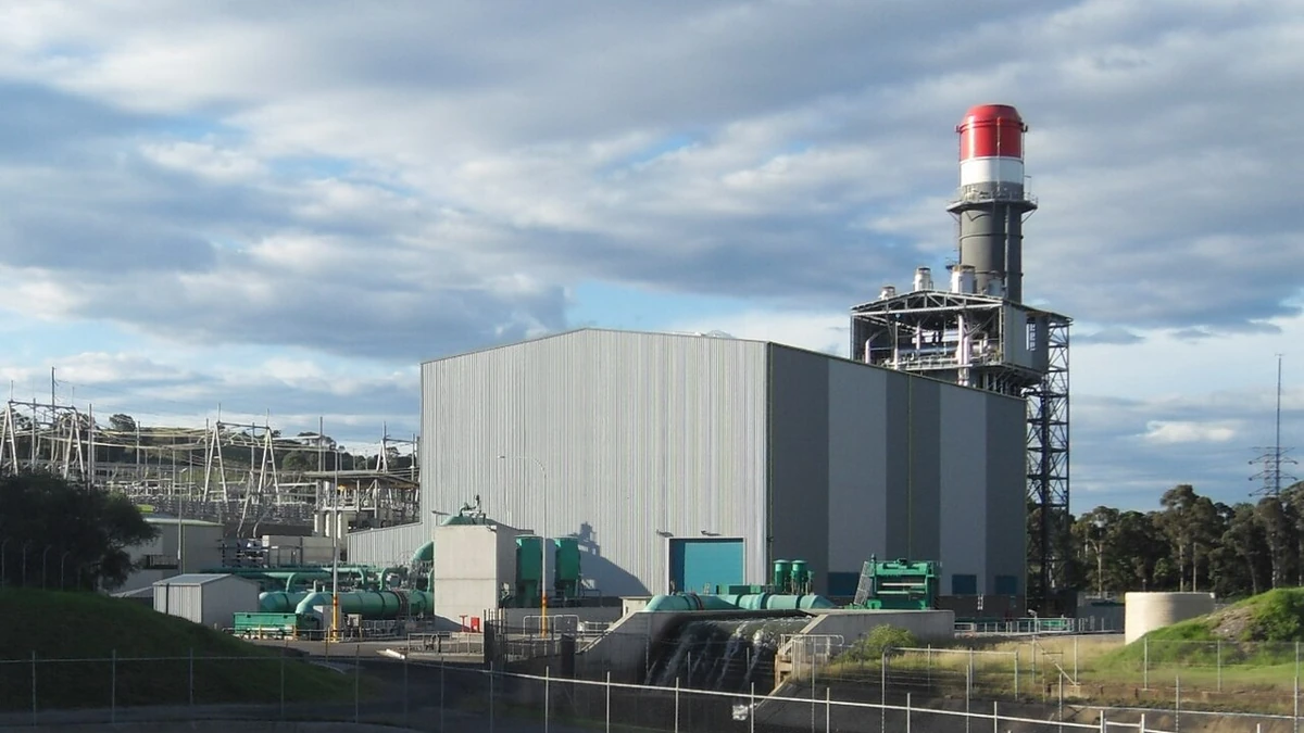 Gas-fired Tallawarra Power Station at Yallah in New South Wales, with its red-topped exhaust stack and generating building.