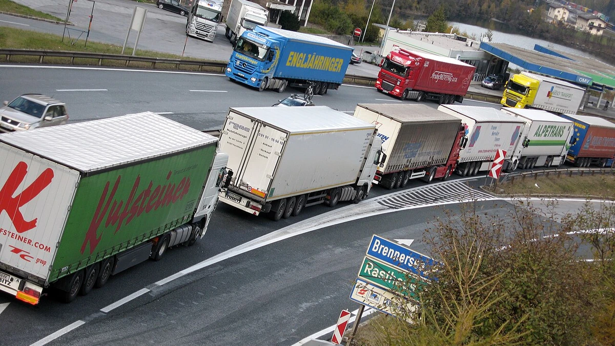 Freight trucks in traffic near the Brenner Pass on the Austria-Italy border.