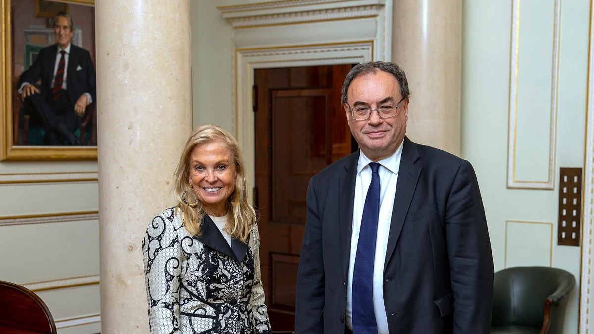 Bank of England Governor Andrew Bailey stands beside then U.S. Ambassador Jane Hartley during a meeting in 2022.