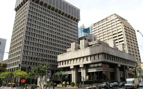 Bank of Hawaii building and neighboring high-rises in downtown Honolulu, viewed from the street.