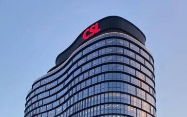 CSL Global Headquarters building in Parkville, Victoria, Australia, with CSL signage at the top.
