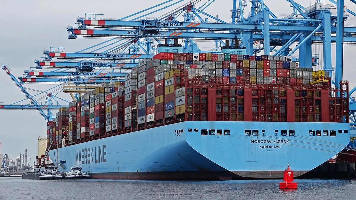 The Moscow Maersk container ship alongside blue container cranes at APM Terminals Maasvlakte 2 in Rotterdam, Netherlands.