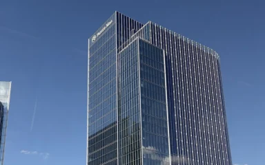 Fannie Mae office building in Reston, Virginia, with company signage visible near the top.