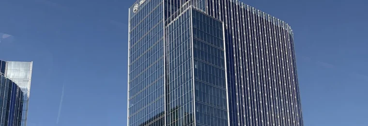 Fannie Mae office building in Reston, Virginia, with company signage visible near the top.