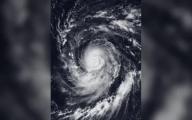 Satellite image of Typhoon Champi over the western Pacific on October 18, 2026.