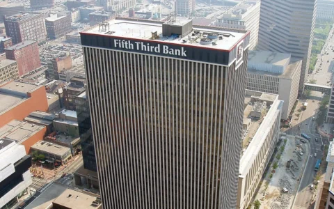Aerial view of the Fifth Third Bank headquarters tower in Cincinnati, with the bank name visible near the roof.