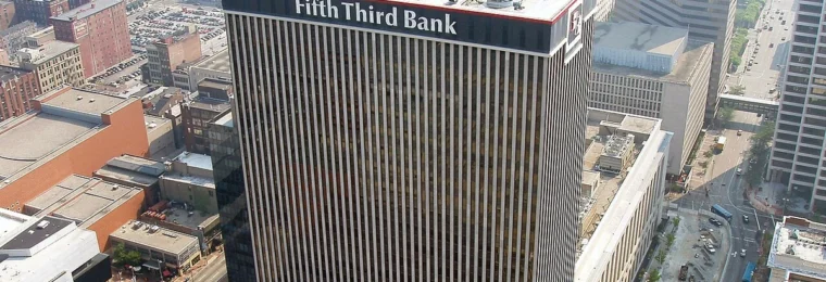 Aerial view of the Fifth Third Bank headquarters tower in Cincinnati, with the bank name visible near the roof.