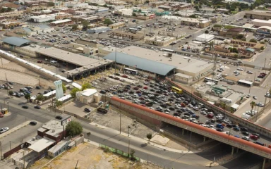 Aerial view of vehicle inspection lanes and traffic at the Paso del Norte Port of Entry in El Paso, Texas.