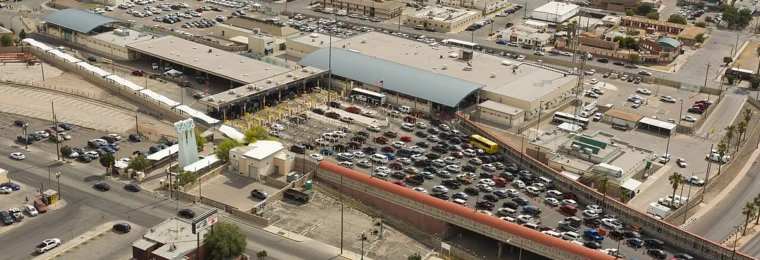 Aerial view of vehicle inspection lanes and traffic at the Paso del Norte Port of Entry in El Paso, Texas.