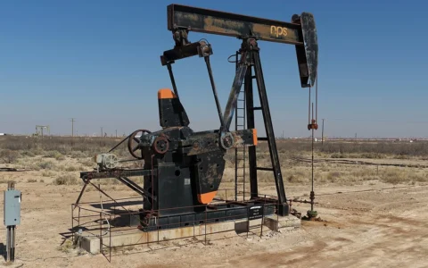 Oil pumpjack operating in the Permian Basin near Monahans, Texas.