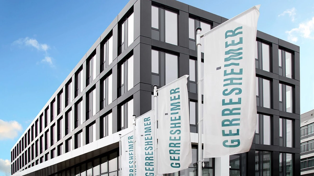 Gerresheimer AG headquarters in Düsseldorf with Gerresheimer flags outside.