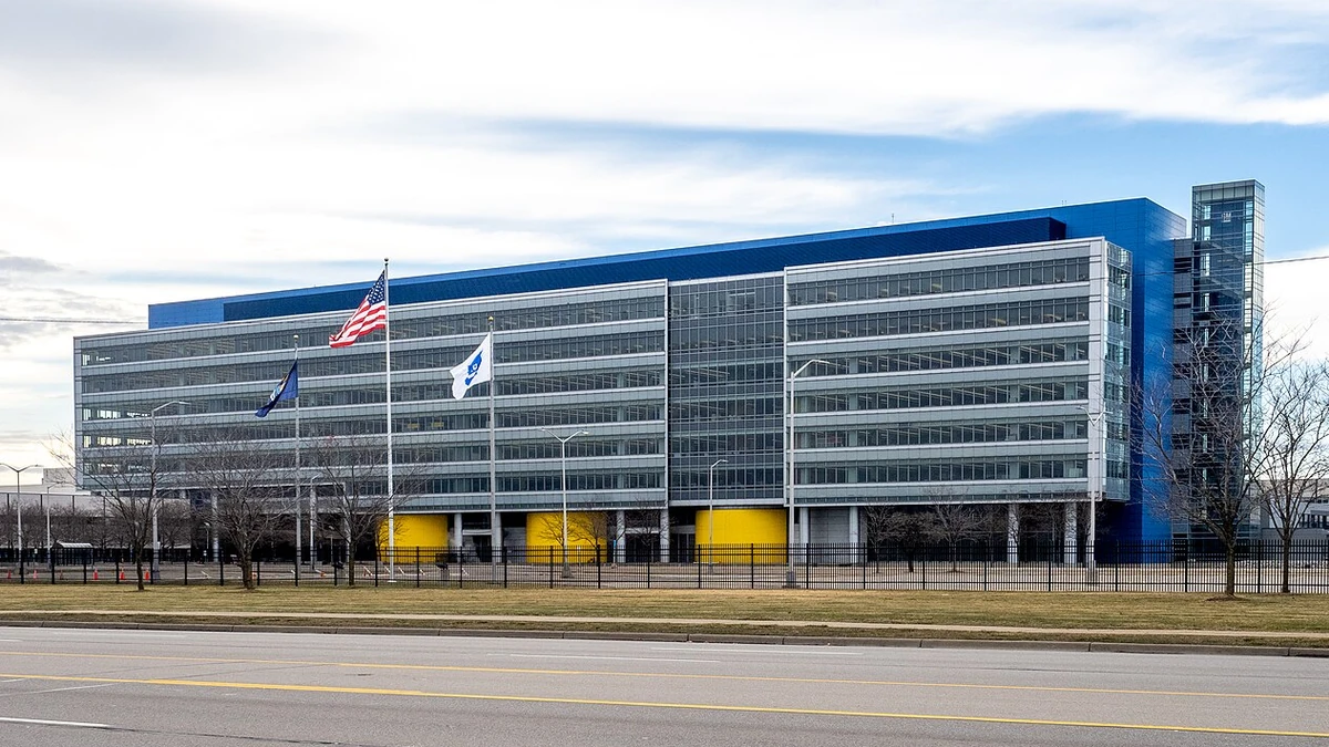 General Motors Technical Center building in Warren, Michigan, with flags outside.