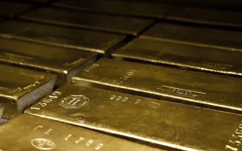 Stacked gold bullion bars.