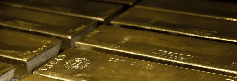Stacked gold bullion bars.