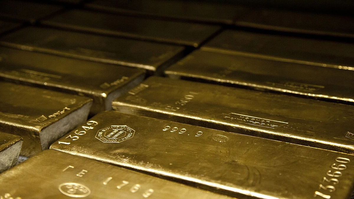 Stacked gold bullion bars.