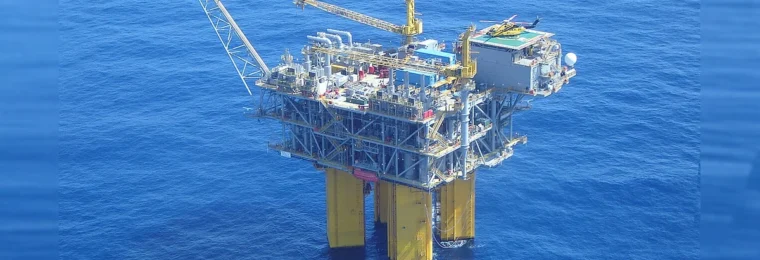Aerial photograph of the BHP-Shenzi deepwater offshore production platform surrounded by Gulf of Mexico waters.