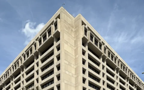 Low-angle view of the International Monetary Fund headquarters building in Washington, D.C.