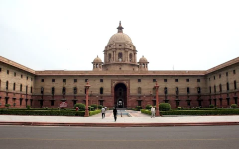 Front facade and central dome of the Indian Ministry of Defence building in New Delhi.