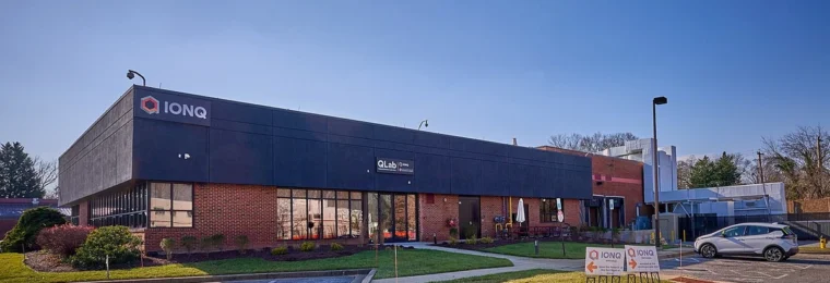 IonQ headquarters building in College Park, Maryland, with the company sign above the entrance.