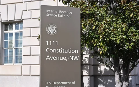 Close-up of a sign outside the Internal Revenue Service building at 1111 Constitution Avenue NW in Washington, D.C.