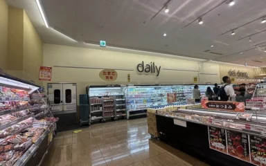 Refrigerated groceries and food displays inside a supermarket in Kanagawa Prefecture, Japan.