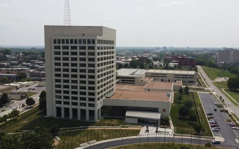 Aerial view of the Federal Reserve Bank of Kansas City headquarters, its adjoining buildings and surrounding streets.