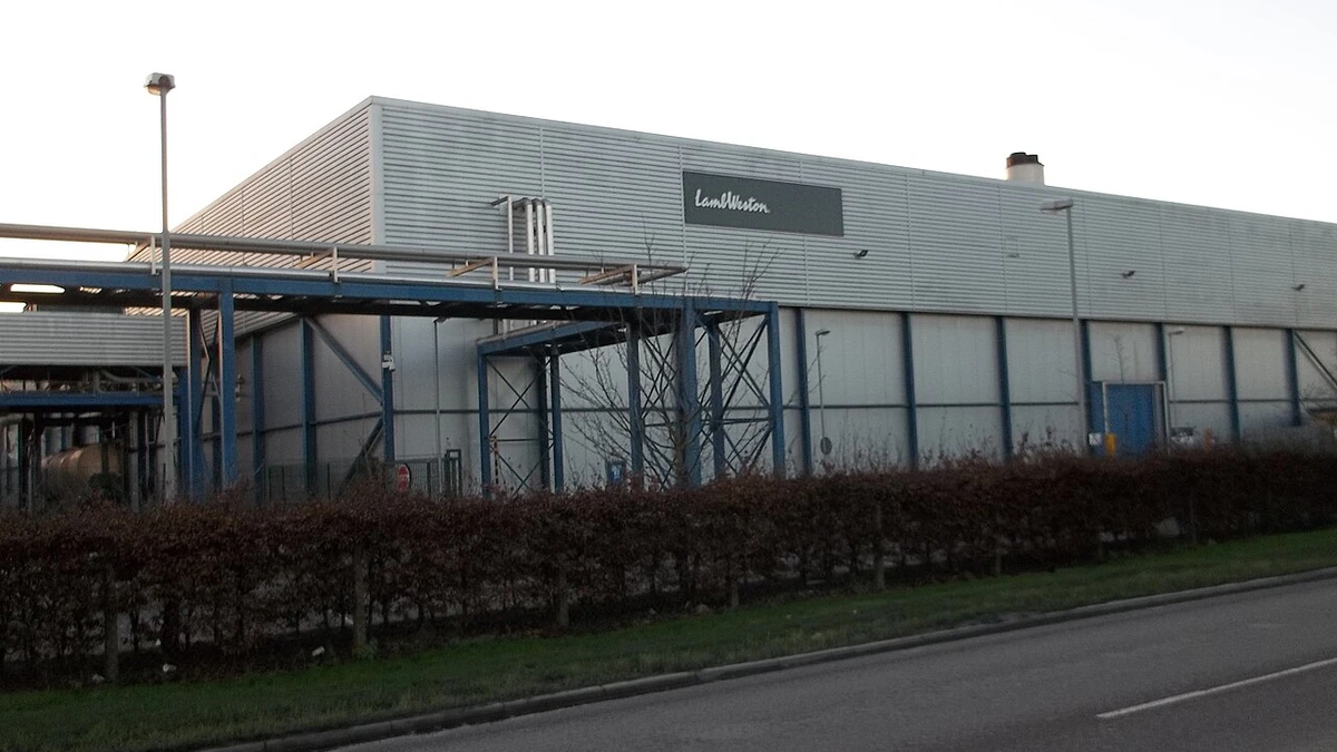 Lamb Weston production facility in Wisbech, England, with the company logo visible on the building.