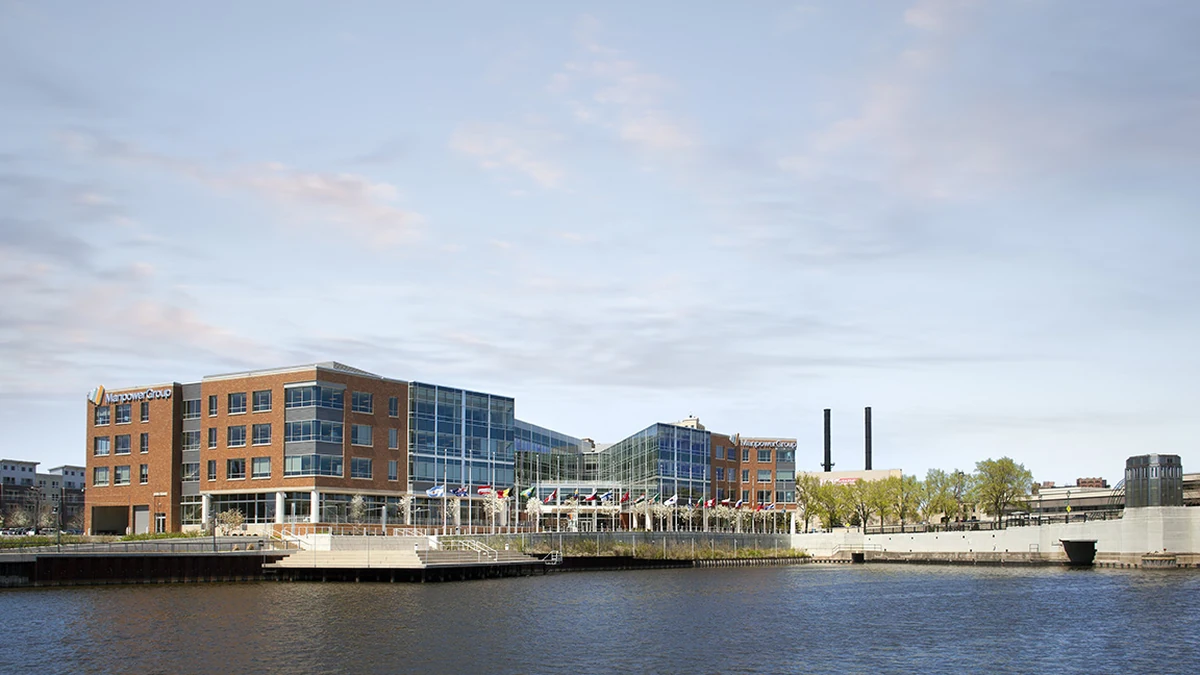 ManpowerGroup world headquarters building beside the Milwaukee River in Milwaukee, Wisconsin.
