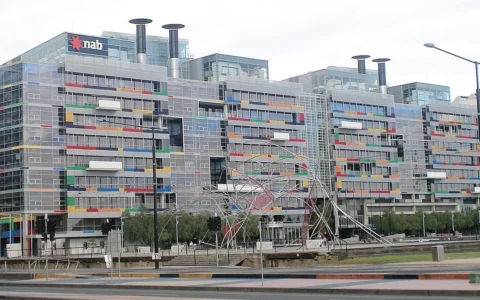 National Australia Bank office building in Melbourne Docklands with NAB signage on the facade.