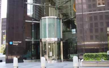 CenterPoint Energy headquarters in Houston with the company logo visible beside the entrance.