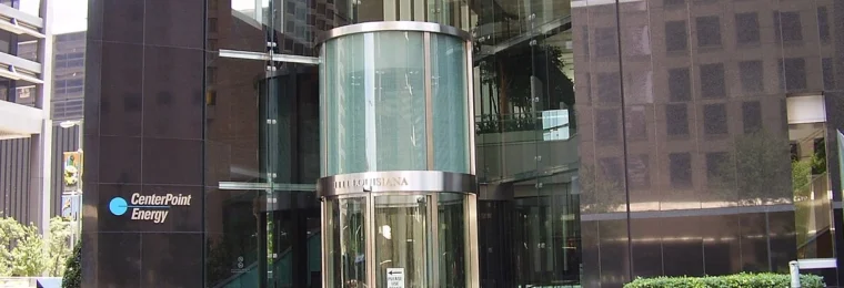 CenterPoint Energy headquarters in Houston with the company logo visible beside the entrance.
