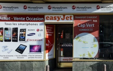 MoneyGram storefront signage at a money-transfer shop on Rue de Reims in Luxembourg City.