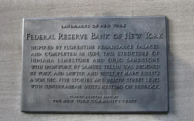 Federal Reserve Bank of New York plaque on the bank's 33 Liberty Street building in Manhattan.