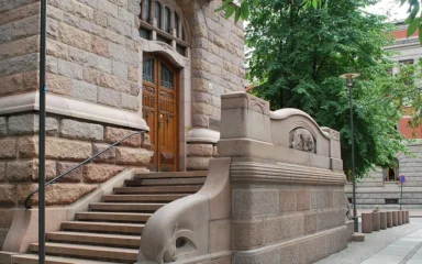 Stone entrance and steps at Norway’s Ministry of Finance building in Oslo.