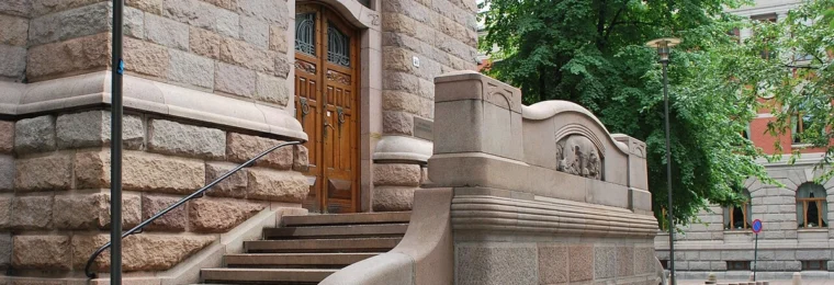 Stone entrance and steps at Norway’s Ministry of Finance building in Oslo.