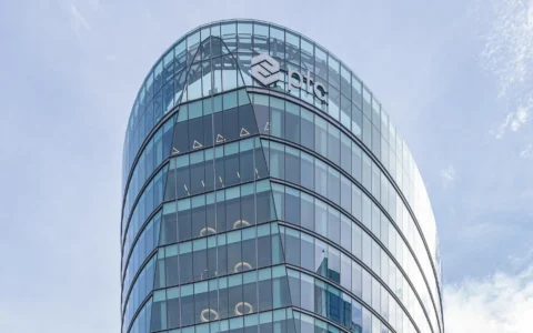 PTC Inc. office building in Boston with the PTC logo visible near the roofline.
