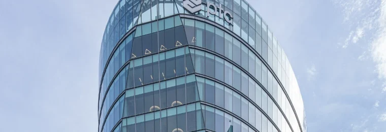 PTC Inc. office building in Boston with the PTC logo visible near the roofline.
