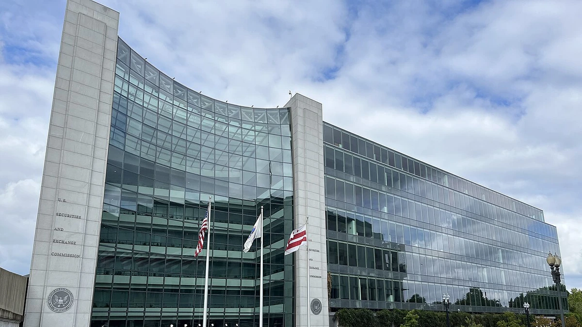 Exterior of the U.S. Securities and Exchange Commission headquarters in Washington, D.C., with flags in front.