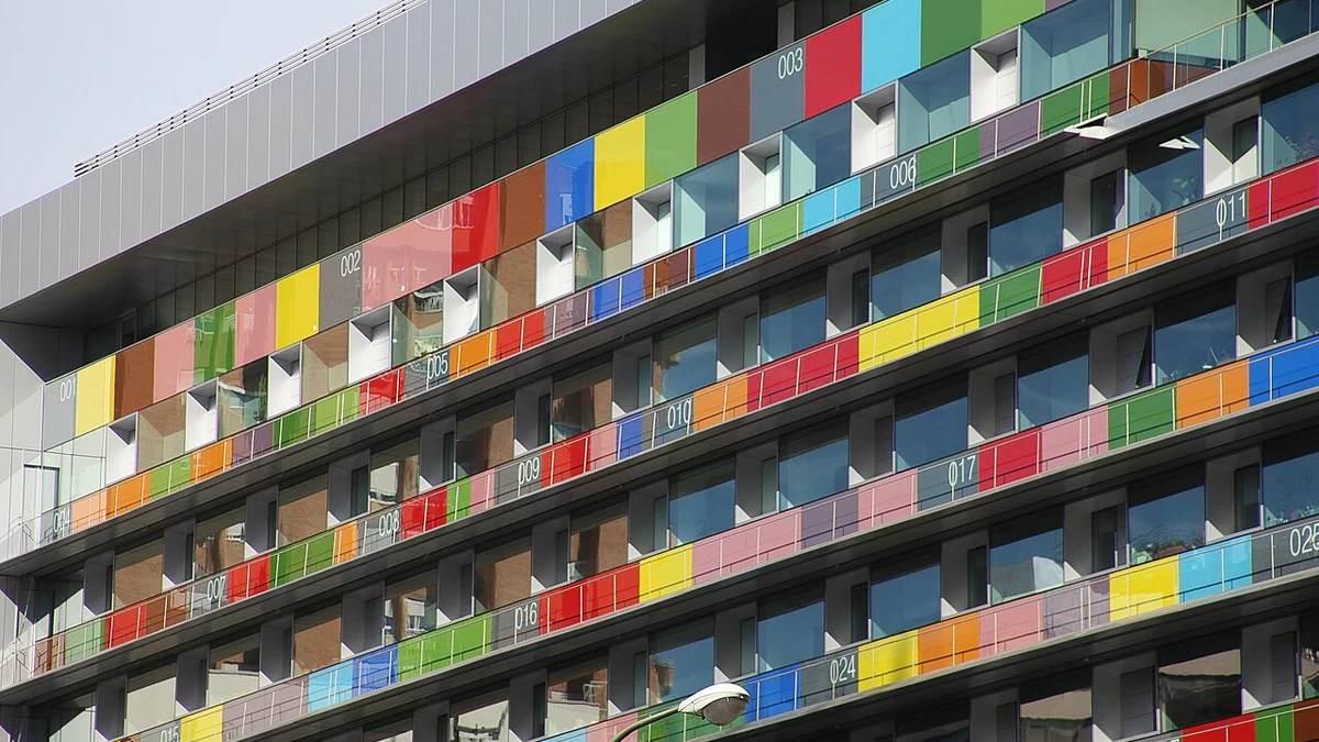 Multicolored numbered panels on the facade of Spain’s National Statistics Institute headquarters in Madrid.