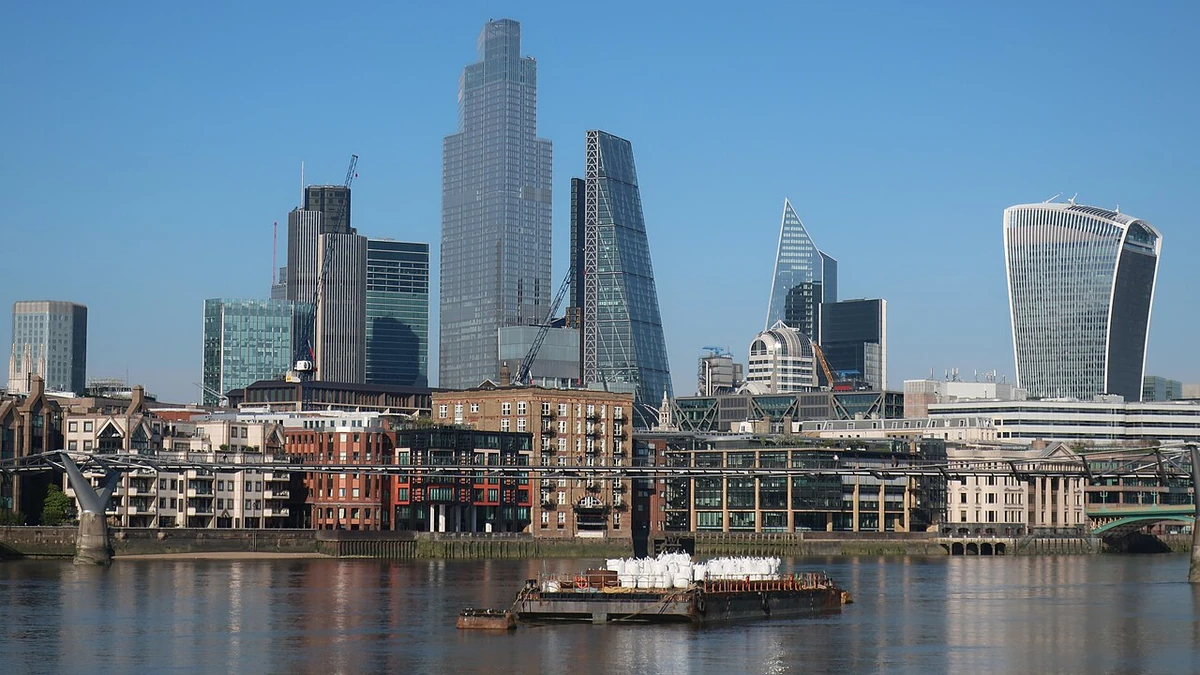 The City of London financial district skyline viewed across the River Thames.