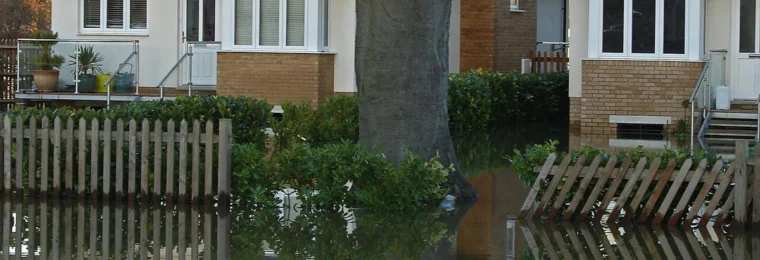 Floodwater surrounding homes in Chertsey, Surrey.