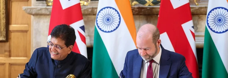 India Commerce Minister Piyush Goyal and UK Business Secretary Jonathan Reynolds signing the UK–India trade agreement in July 2025.